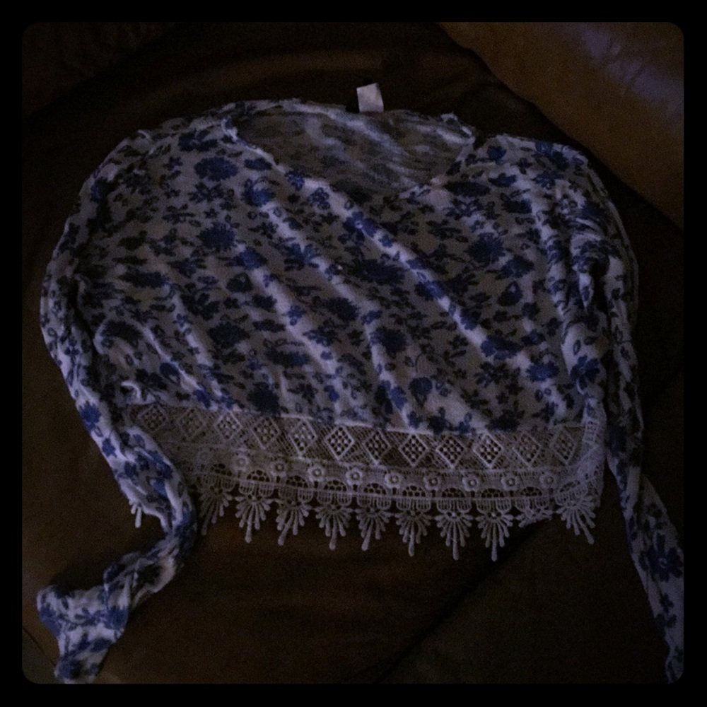 A blue and white Long sleeve crop top